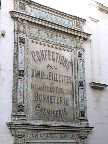 Old au Printemps (now a large Department Store) sign in Pont Audemer