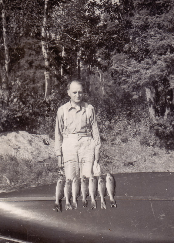 Clayton Pincock (rear of boat), Graham Pincock (with oar