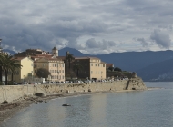 This is just one little corner of Ajaccio, a lively city on the west coast of Corsica. Once you round this bend, you'll be greeted by two or three huge cruisehips and hundreds of restaurants and cafes lining the waterfront.