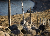 A fence to keep the animals from the cliff in the Cove (by Andrew Spearns)